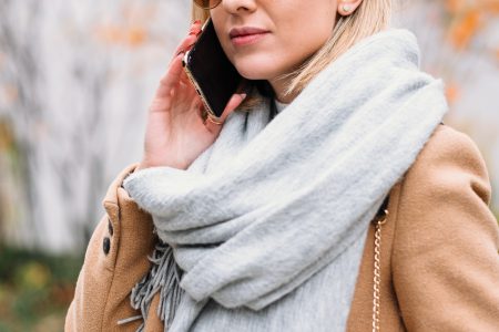 A female talking on the phone on an autumn day 3 - free stock photo
