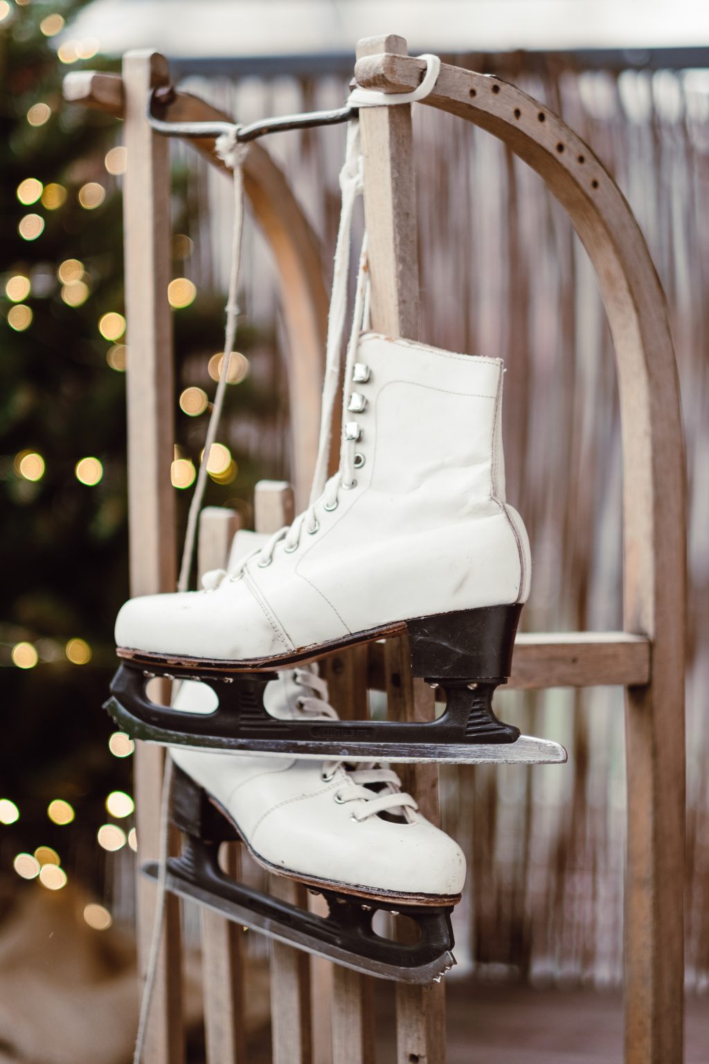 Vintage ice skates on a wooden sled - free stock photo