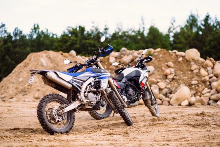 Two motorbikes at a sand quarry - free stock photo