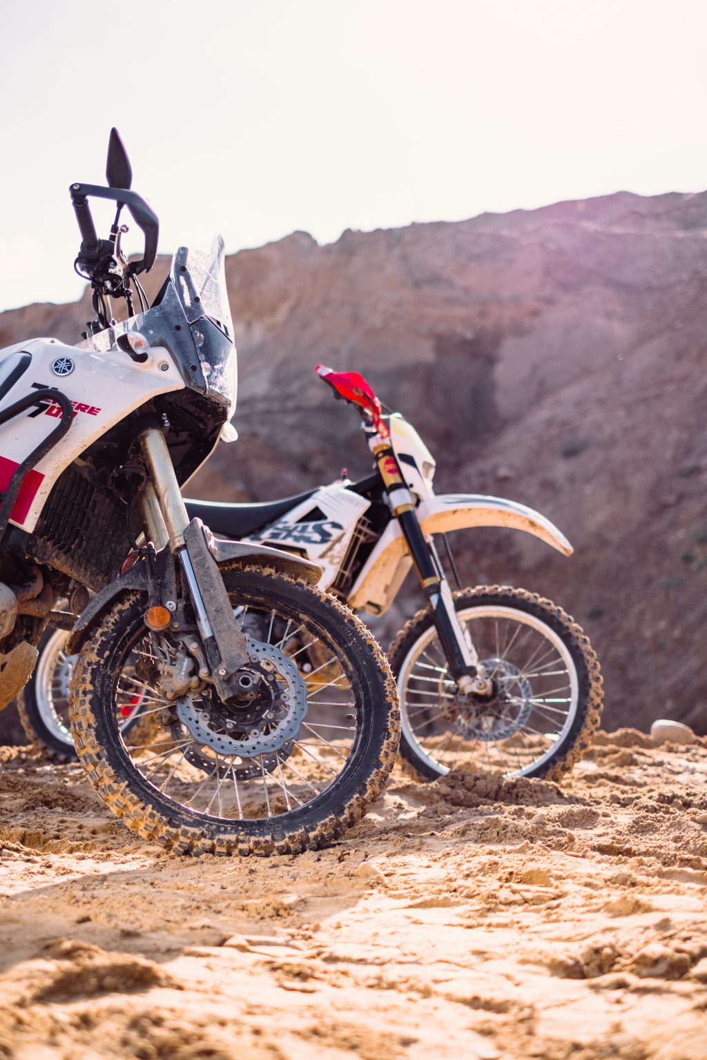 two_motorbikes_at_a_sand_quarry_details_