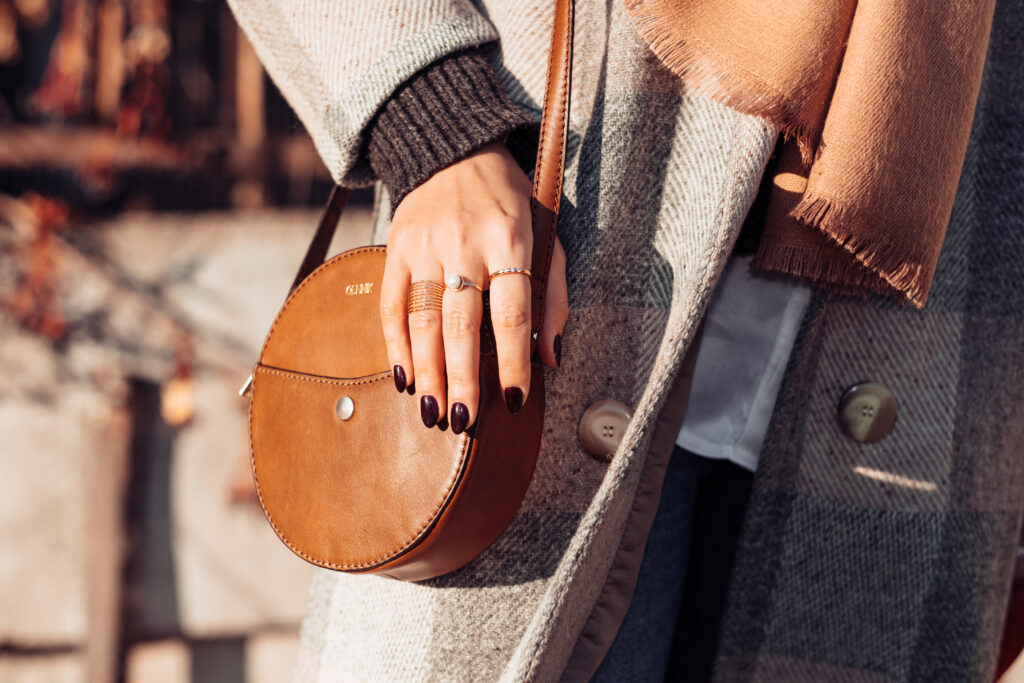 Female wearing a coat on a sunny autumn afternoon closeup 6 - free stock photo