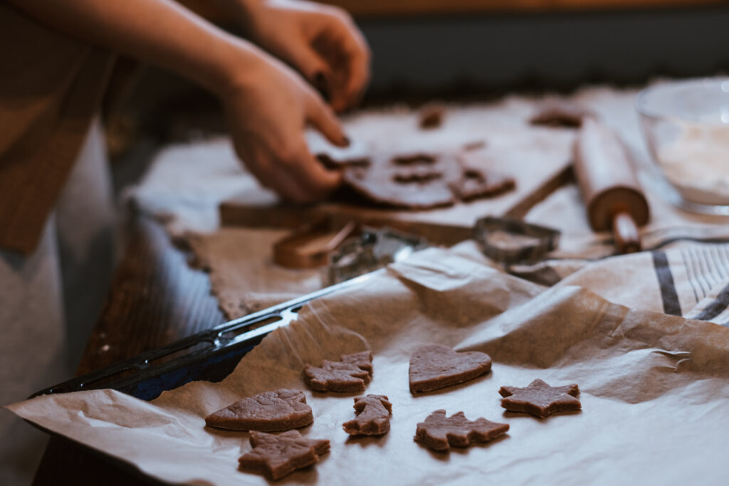 cutting_out_gingerbread_christmas_biscui