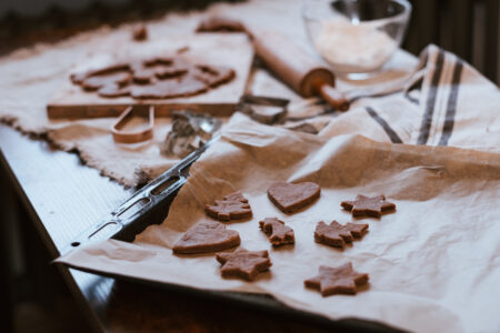 Cutting out gingerbread Christmas biscuits 12 - free stock photo