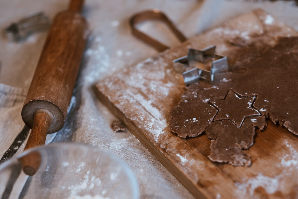 cutting_out_gingerbread_christmas_biscui