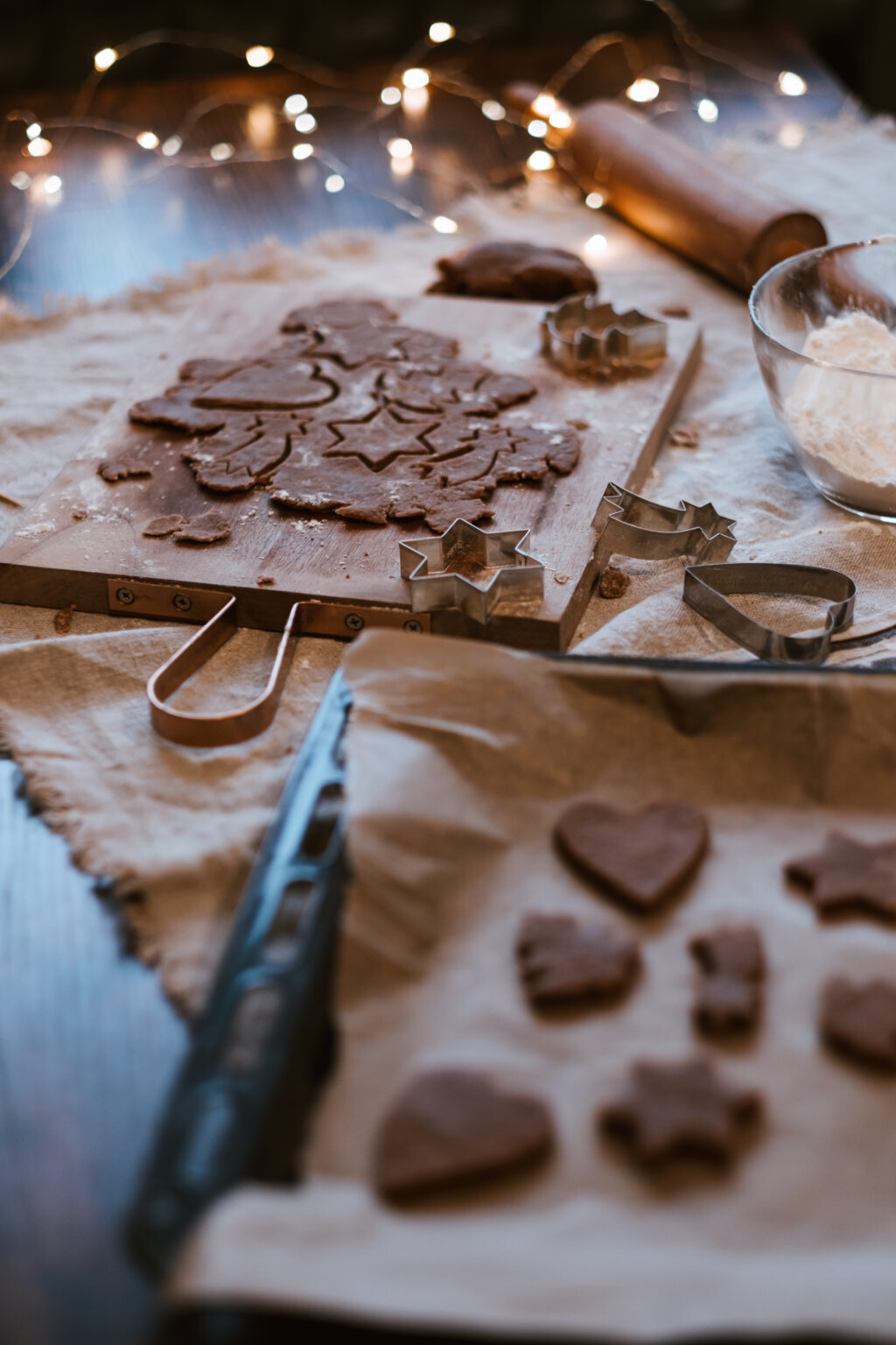 Cutting out gingerbread Christmas biscuits 8 - free stock photo