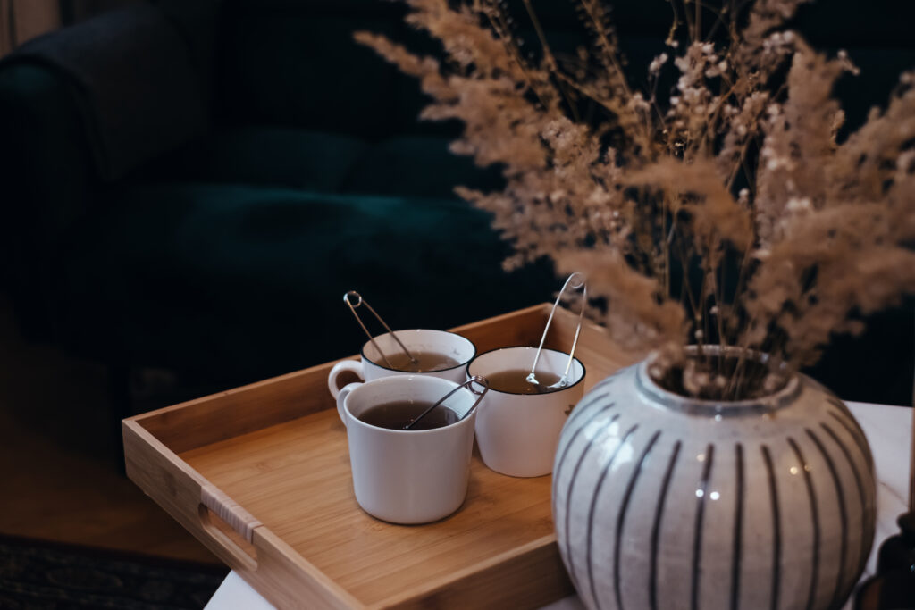 Tea brewing in ceramic cups on a wooden tray 3 - free stock photo