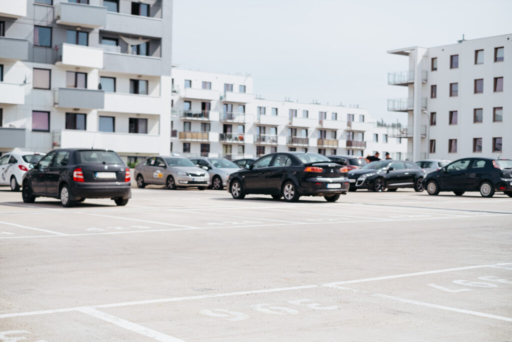 cars parked in a modern residential area cars parked in a modern residential area