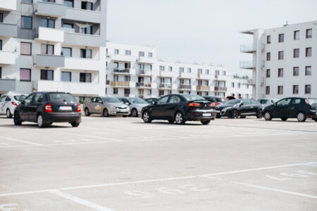 Cars parked in a modern residential area - free stock photo