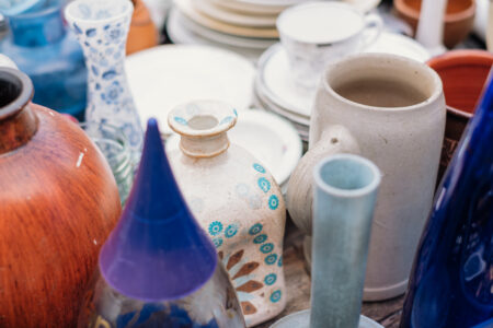 Old vintage ceramic pots and vases at a flea market - free stock photo