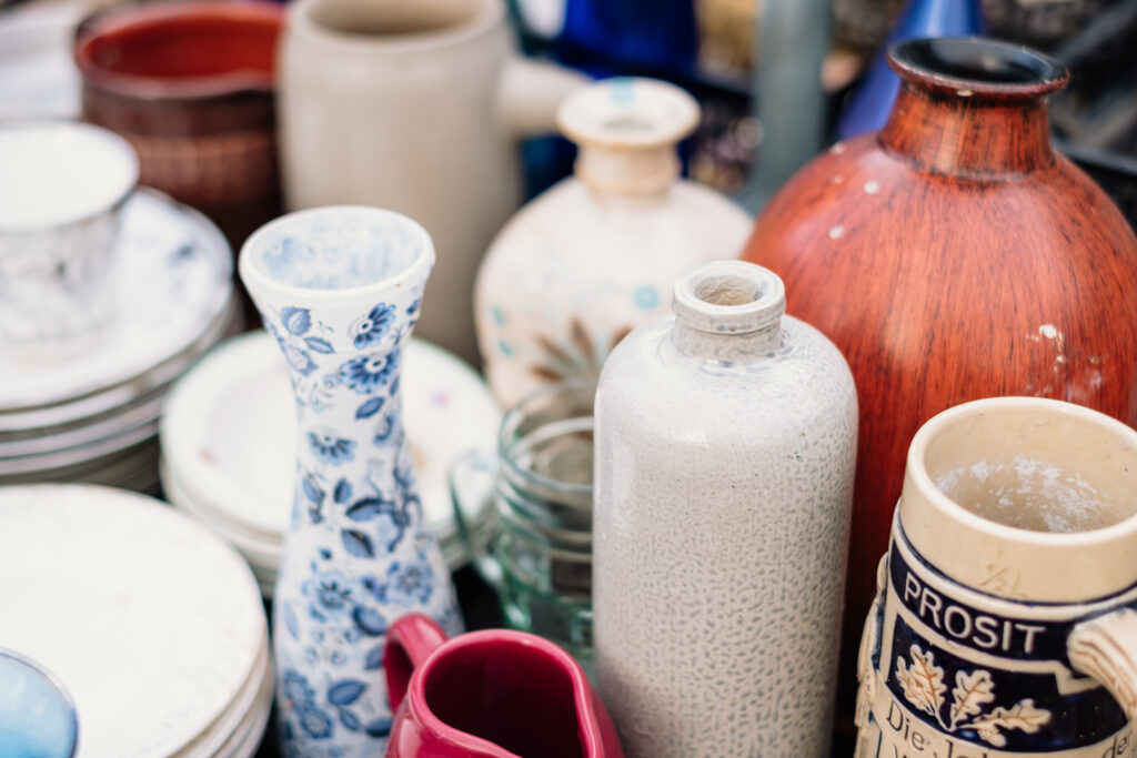 Old vintage ceramic pots and vases at a flea market 4 - free stock photo